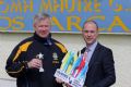 Paddy Kelly receives Sports Volunteer Award from Jonathan Robinson Coleraine Branch Manager of Hughes Insurance